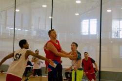 Students playing intramural basketball in the Student Recreation Center.